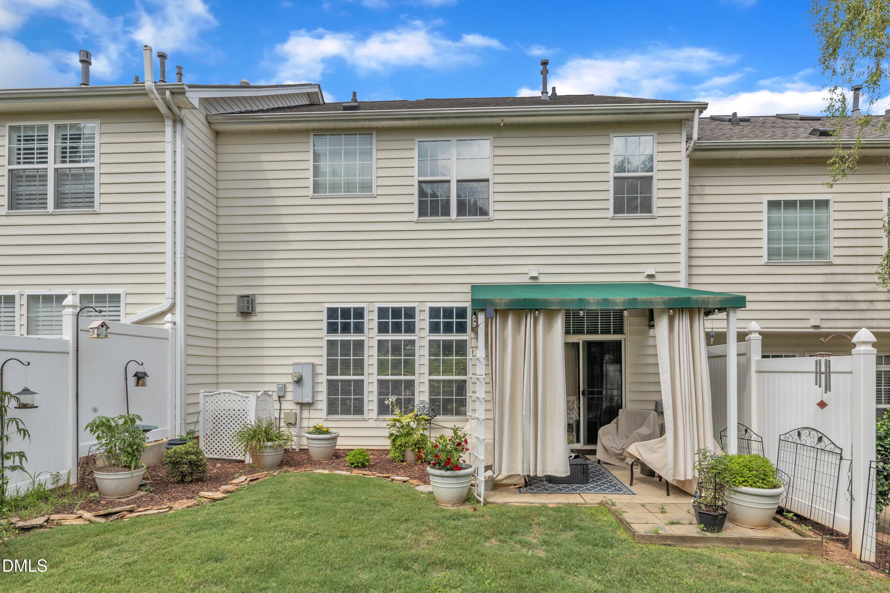 12227 Orchardgrass Lane Raleigh, NC 27614 - Photo 43 of 46 a front view of house with yard and outdoor seating