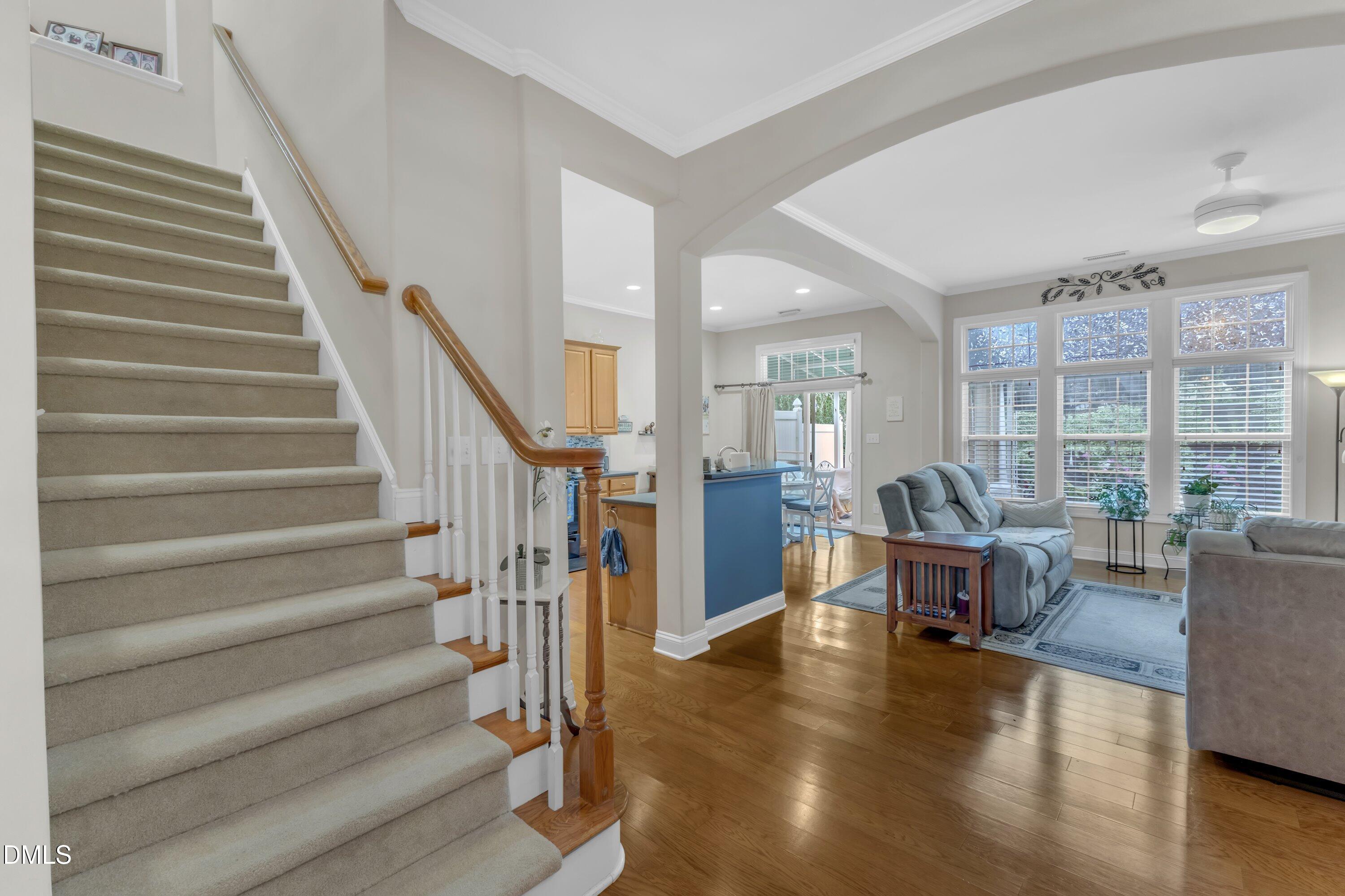 12227 Orchardgrass Lane Raleigh, NC 27614 - Photo 10 of 46 a view of entryway livingroom and hall with wooden floor