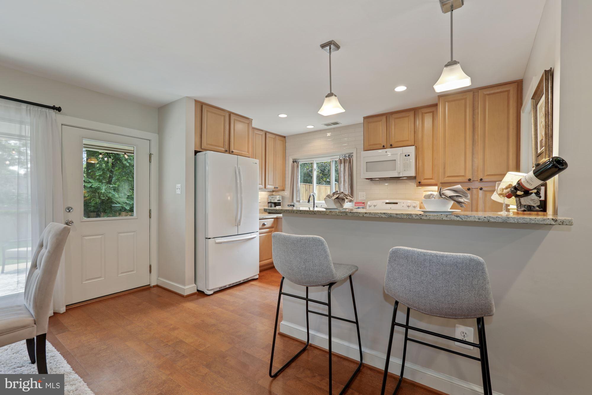 5410 Ferndale Street Springfield, VA 22151 - Photo 8 of 40 Breakfast bar w/ pendant lighting