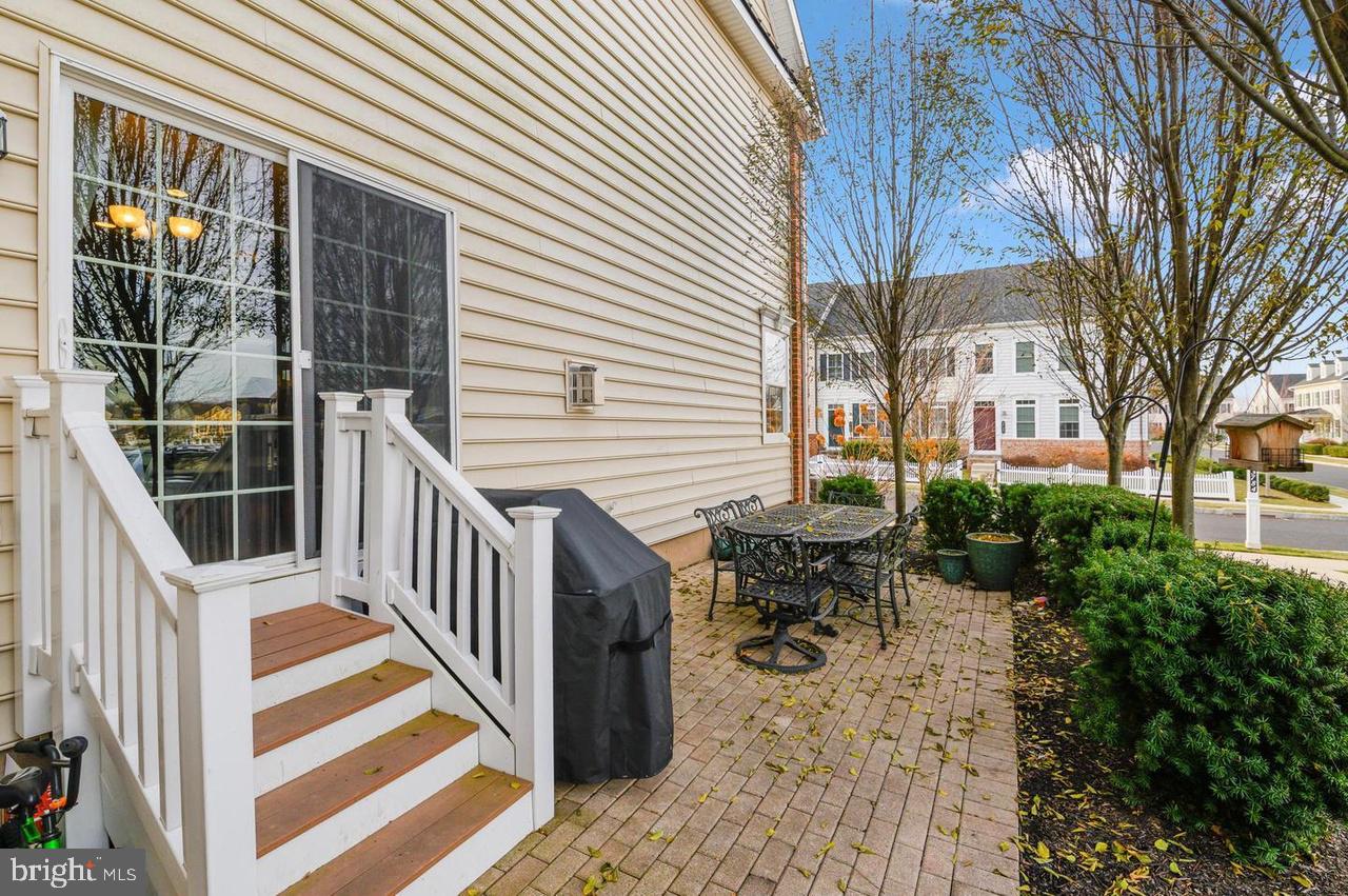 3784 William Daves Road Doylestown, PA 18902 - Photo 30 of 30 a view of a patio with table and chairs and wooden fence