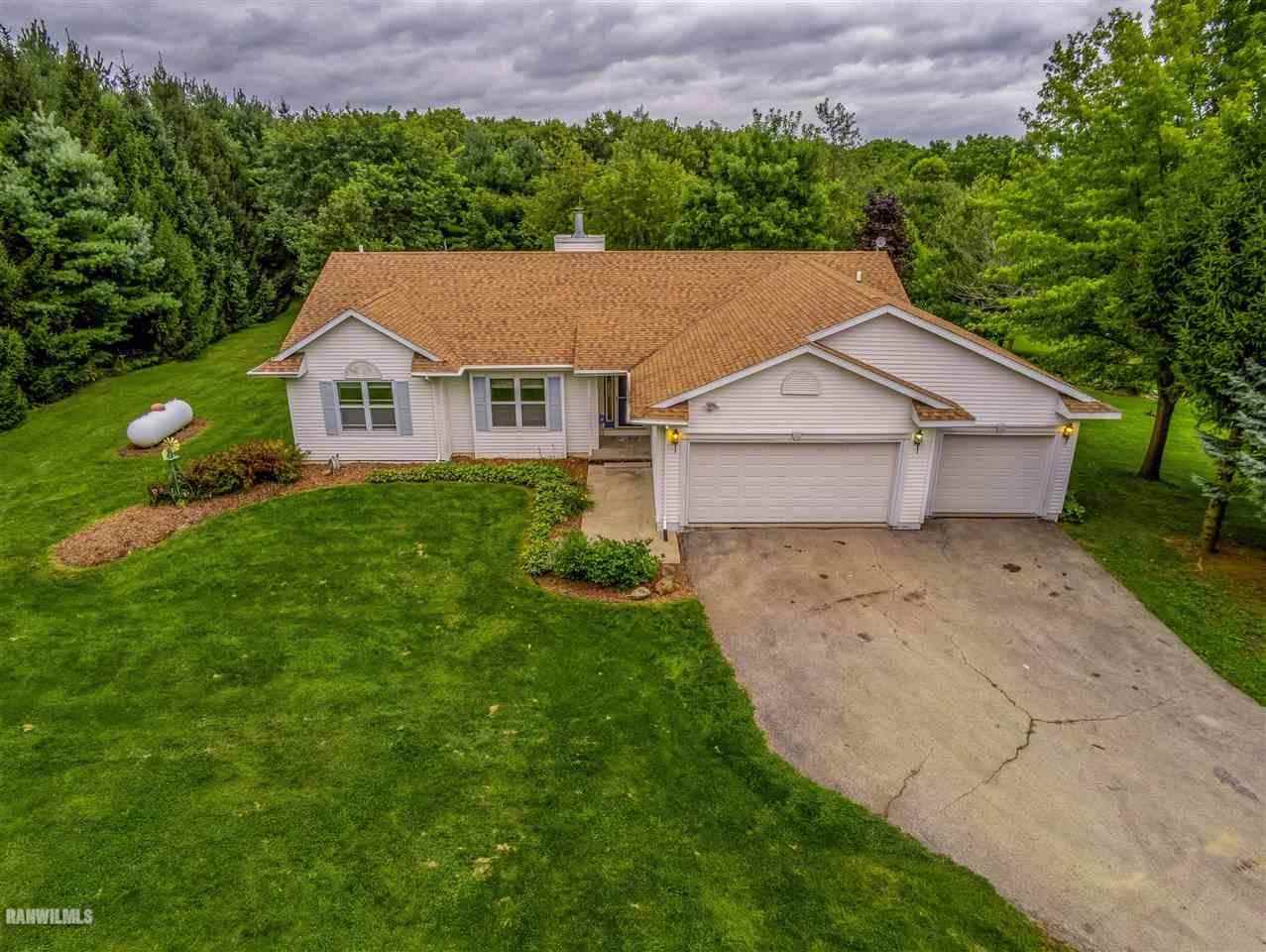 16867 Hartman Road Davis, IL 61019 - Photo 3 of 39 front view of a house with a yard