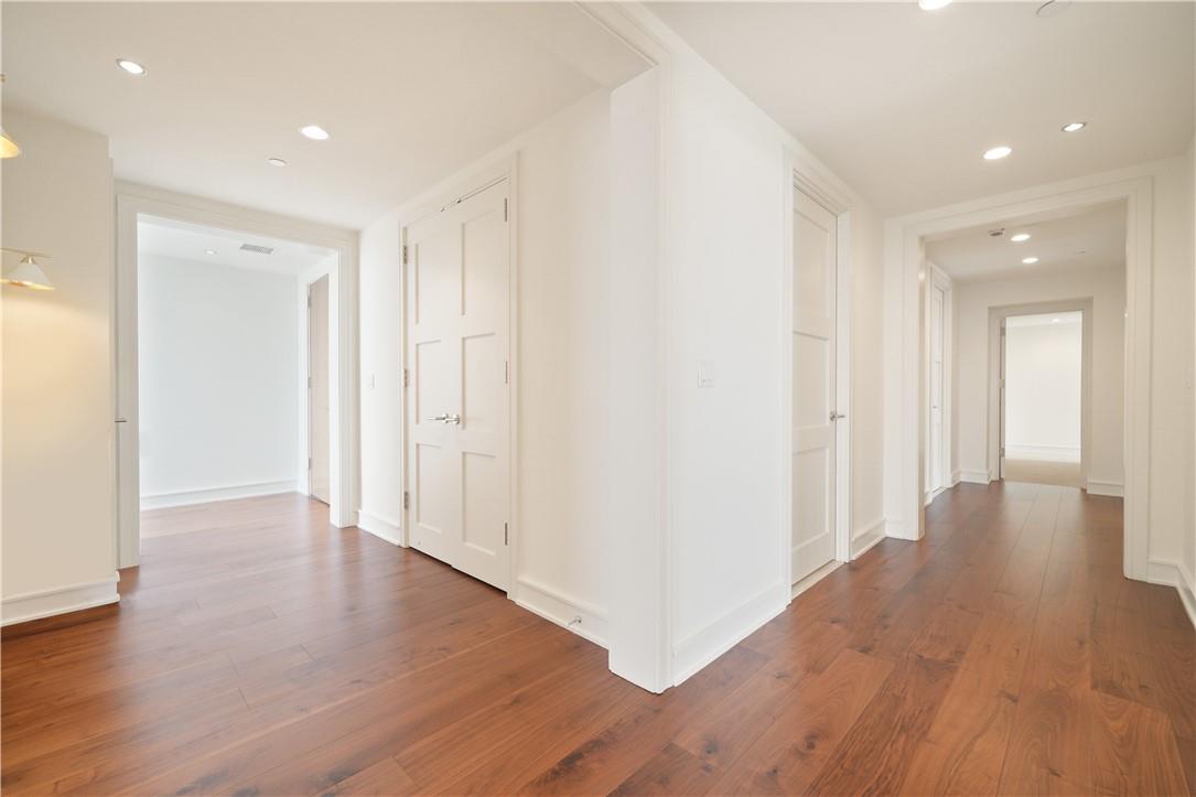 1 Renaissance Square, Unit PH2BC White Plains, NY 10601 - Photo 21 of 36 a view of a hallway with wooden floor