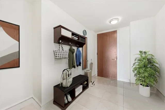 a view of entryway with livingroom