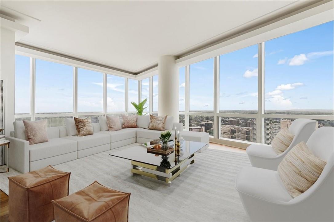 1 Renaissance Square, Unit PH2BC White Plains, NY 10601 - Photo 4 of 36 a living room with furniture and a large window