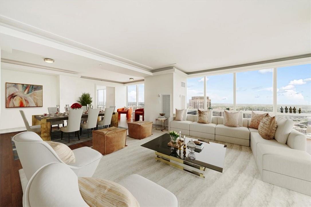 1 Renaissance Square, Unit PH2BC White Plains, NY 10601 - Photo 8 of 36 a living room with furniture and a large window