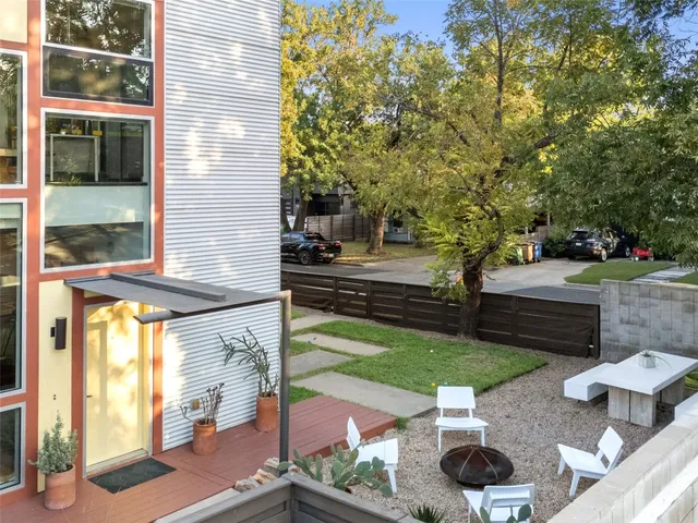 a view of yard with patio