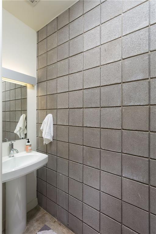 5502 Guadalupe Street, Unit 1 Austin, TX 78751 - Photo 10 of 33 First floor guest half bath.