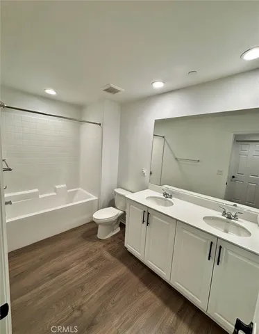 a utility room with washer and dryer