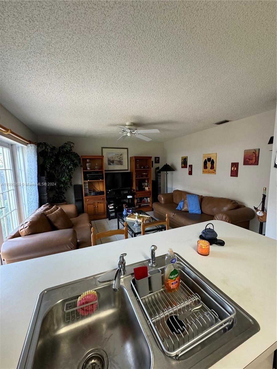 19232 Northwest 88th Place Hialeah, FL 33018 - Photo 24 of 61 a room with furniture