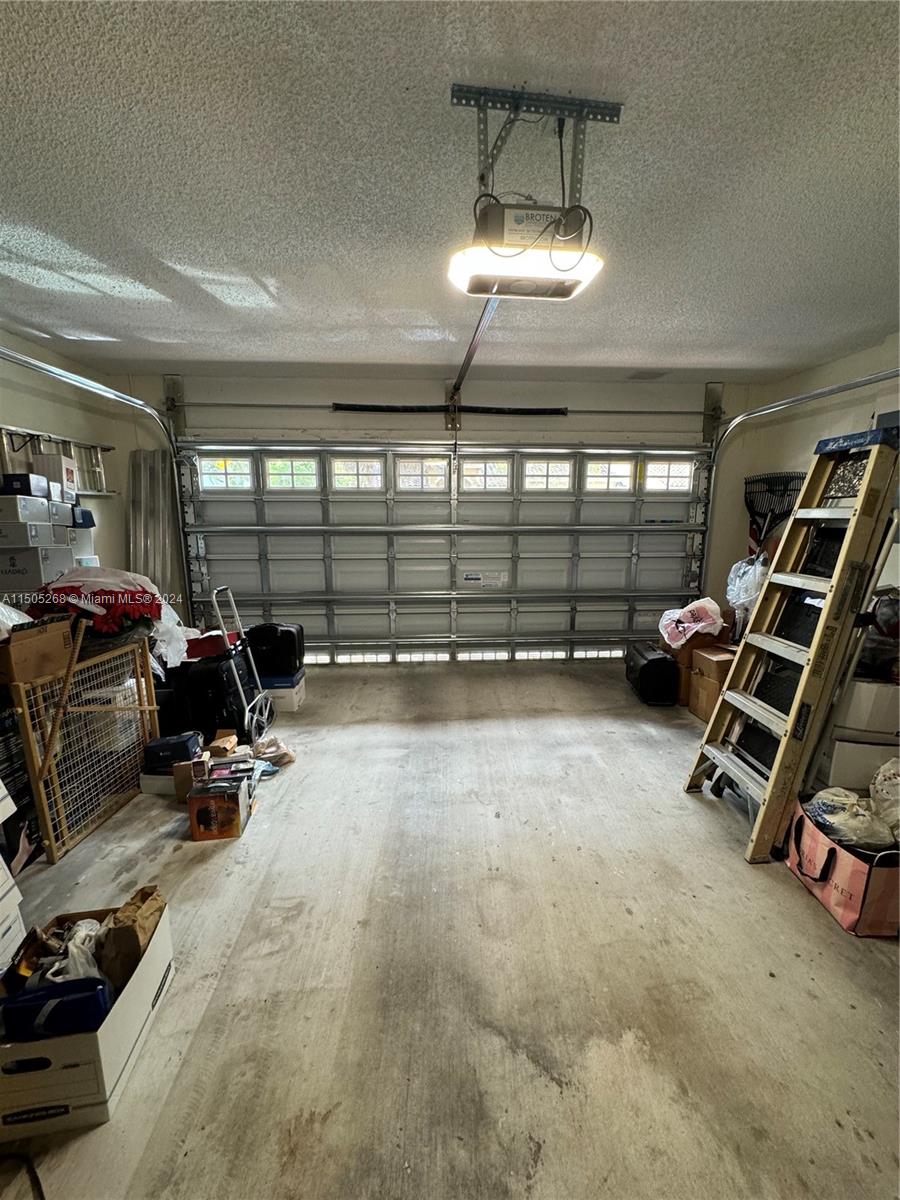 19232 Northwest 88th Place Hialeah, FL 33018 - Photo 26 of 61 a view of a room with gym equipment