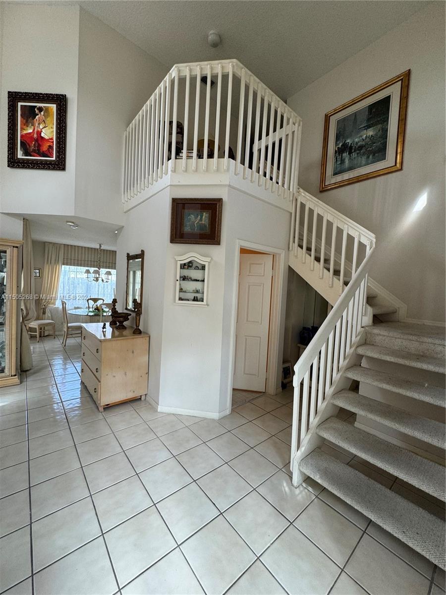 19232 Northwest 88th Place Hialeah, FL 33018 - Photo 29 of 61 a view of entryway and hall