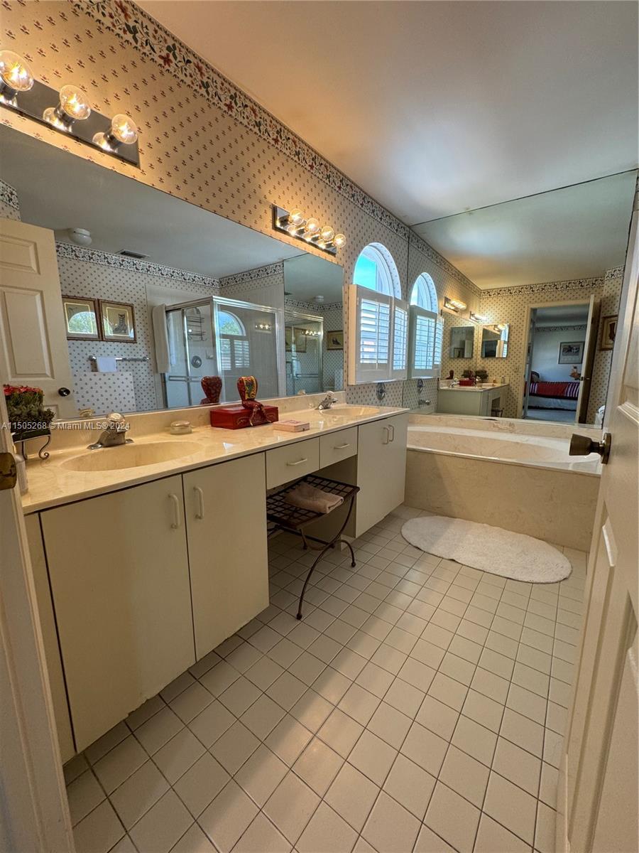 19232 Northwest 88th Place Hialeah, FL 33018 - Photo 35 of 61 a kitchen with a sink cabinets and window