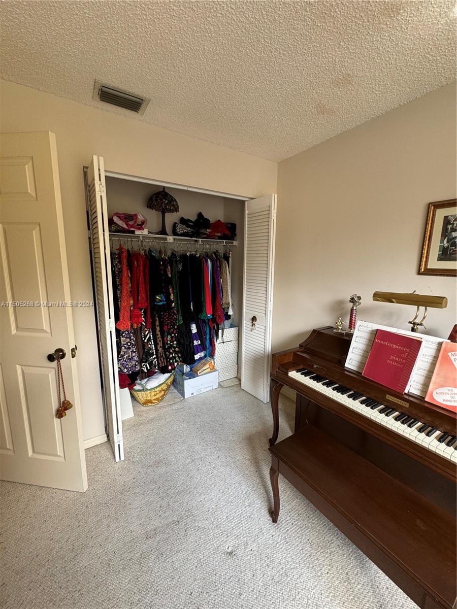 19232 Northwest 88th Place Hialeah, FL 33018 - Photo 48 of 61 a view of a livingroom with furniture