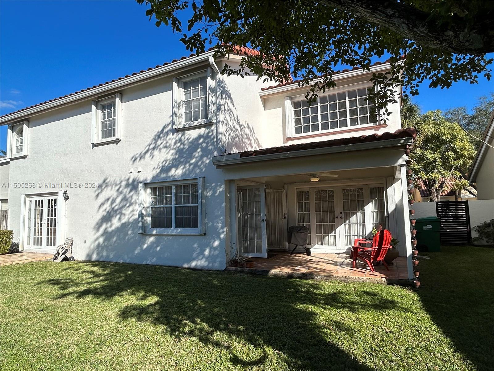 19232 Northwest 88th Place Hialeah, FL 33018 - Photo 57 of 61 a view of house with yard