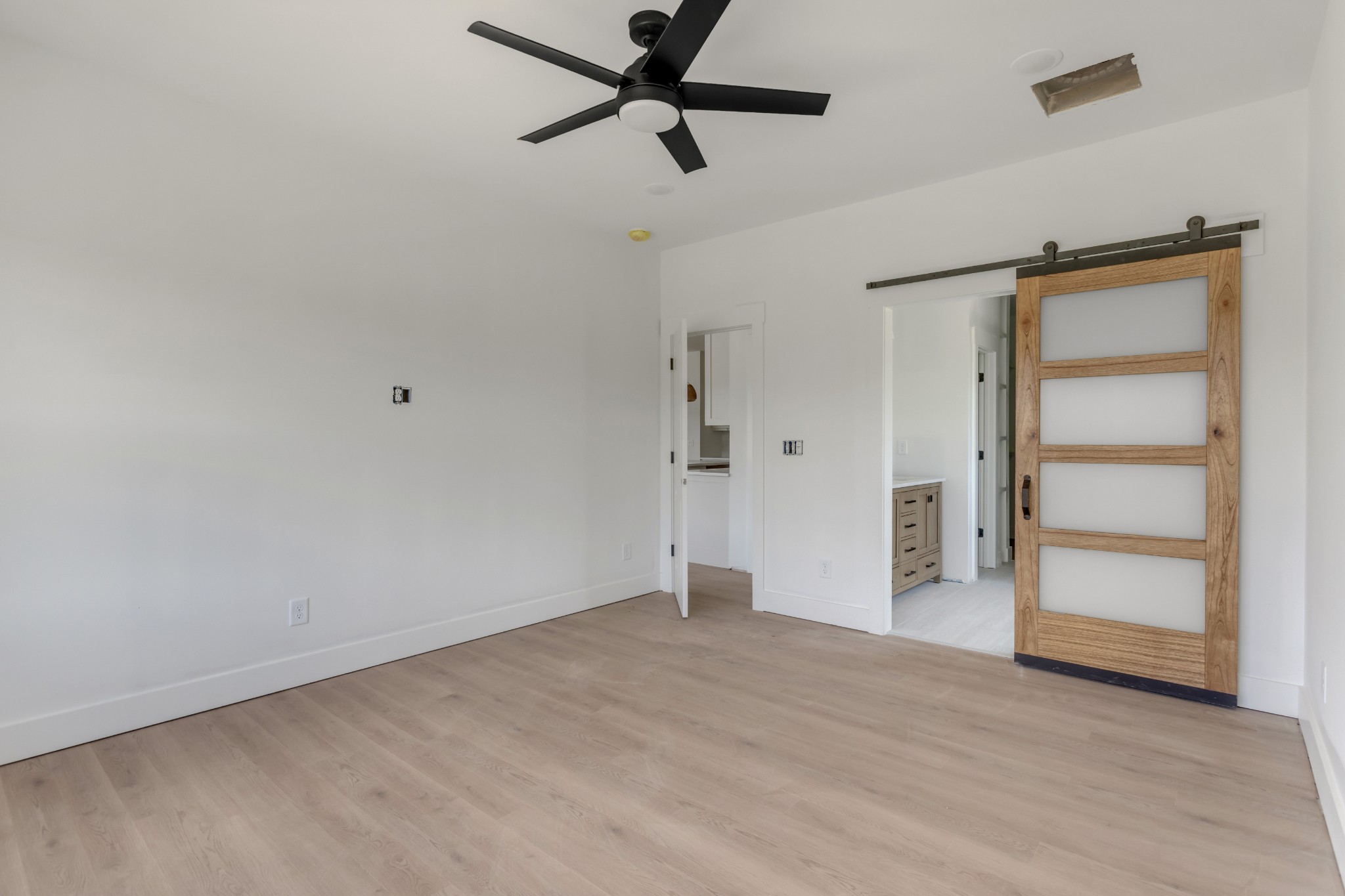 1171 Abiff Road Bon Aqua, TN 37025 - Photo 20 of 45 an empty room with closet and windows