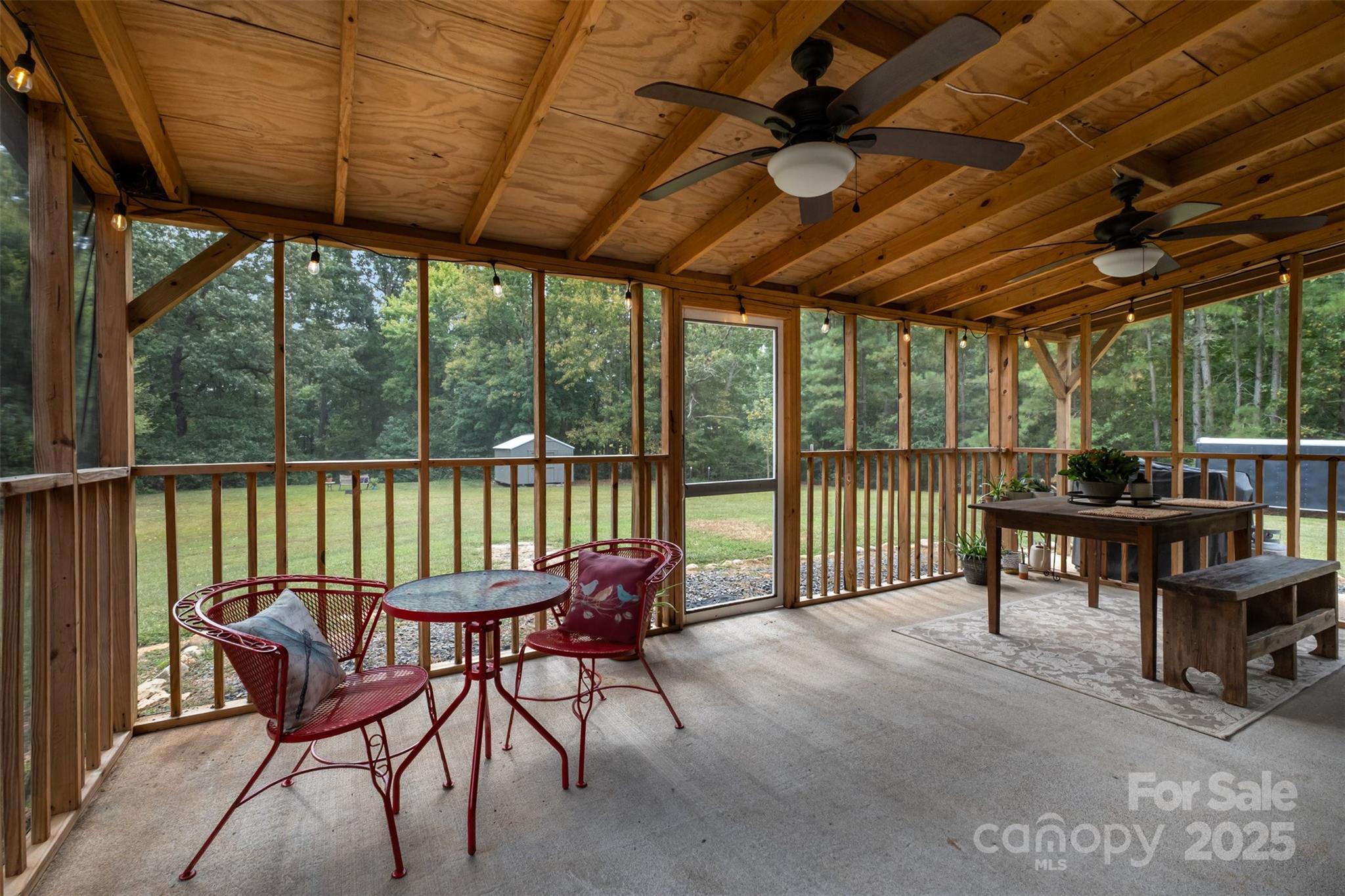 690 Hill Road Wadesboro, NC 28170 - Photo 16 of 26 a view of a chairs and table in the patio