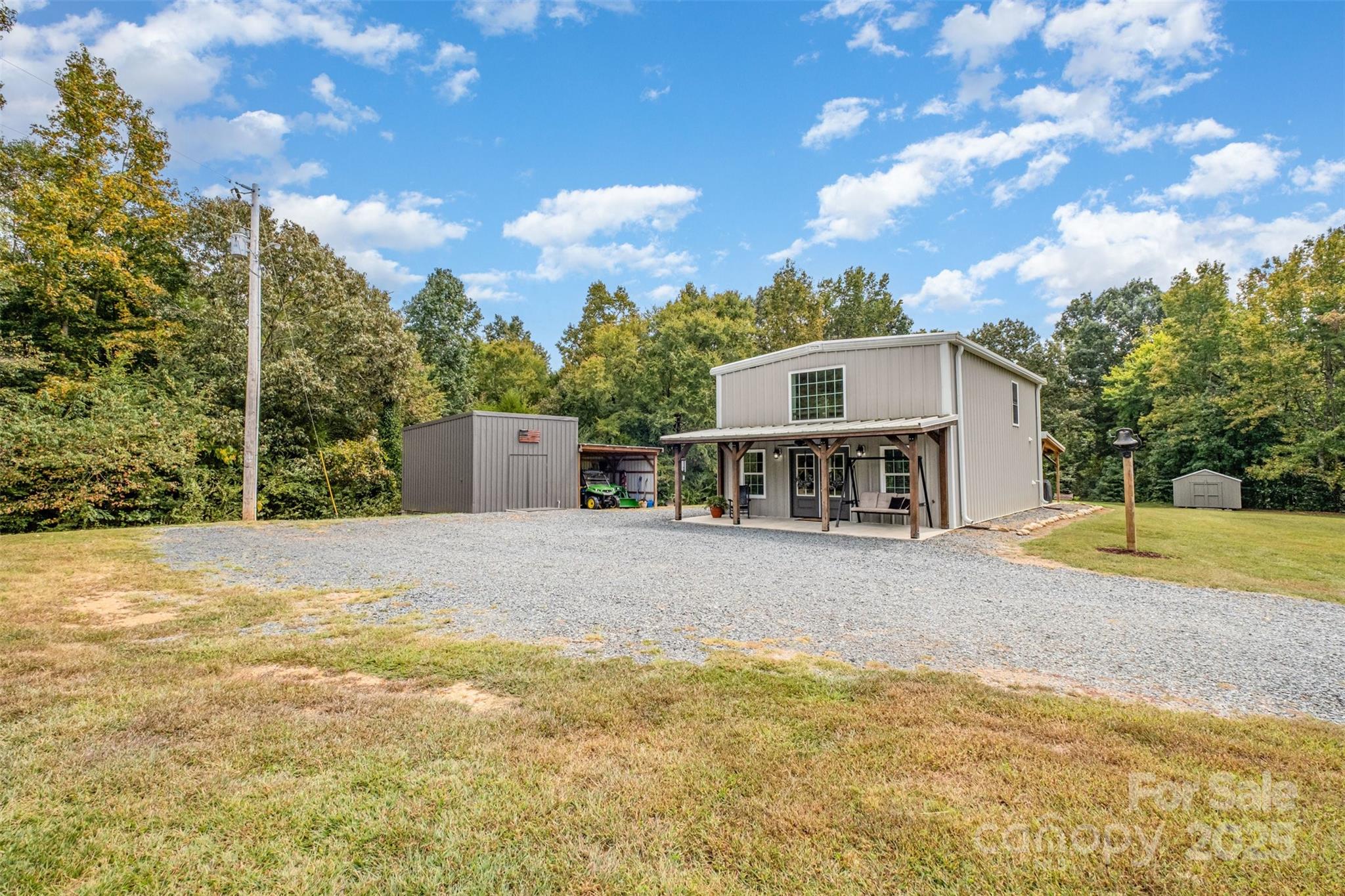 690 Hill Road Wadesboro, NC 28170 - Photo 17 of 26 a front view of a house with a yard and trees
