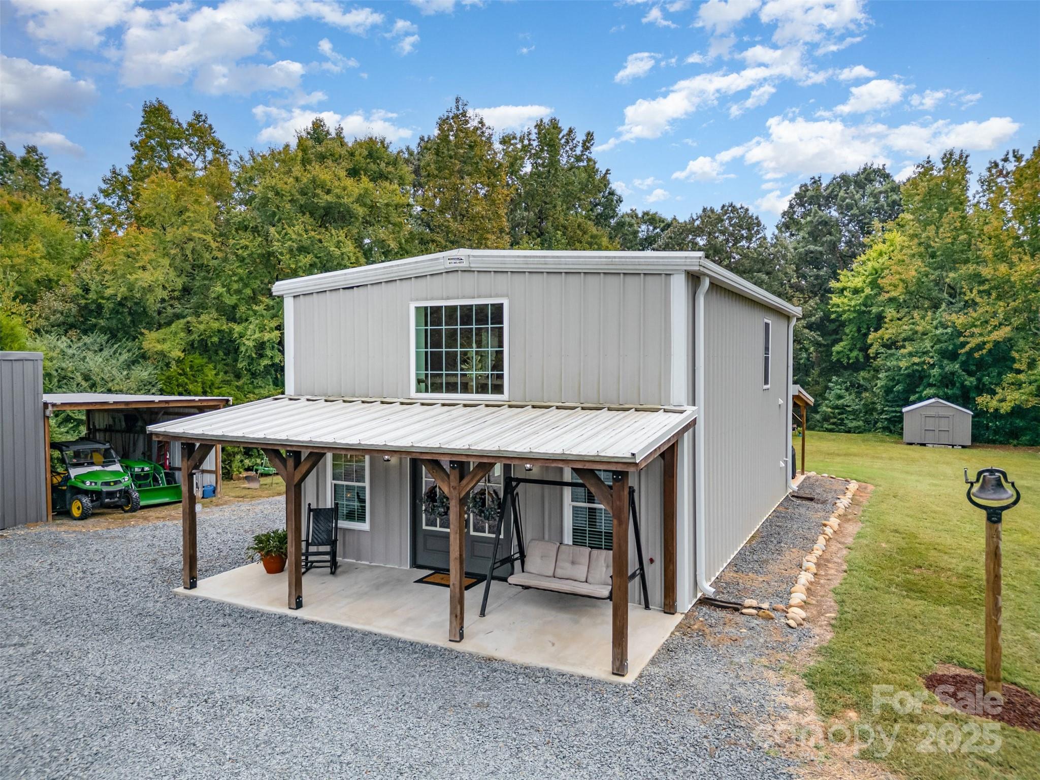690 Hill Road Wadesboro, NC 28170 - Photo 3 of 26 a view of a house with a yard and furniture