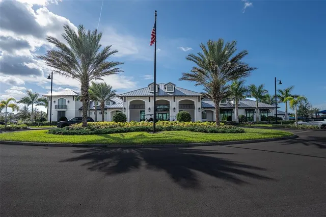 a view of a lake with a building in the background