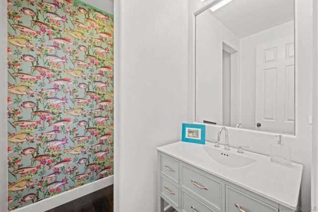 a bathroom with a tub and a shower