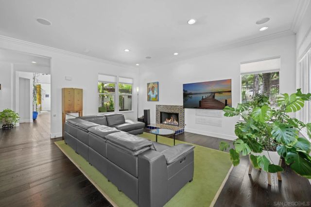 view of a house with a yard and garden