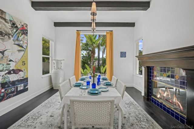 a view of a backyard with plants and patio