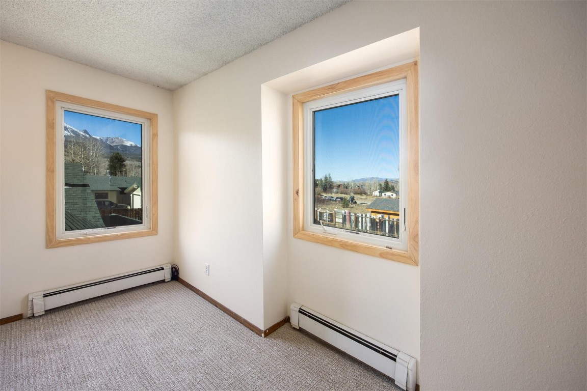 420 Reese Road Silverthorne, CO 80498 - Photo 25 of 50 a view of an empty room with a window