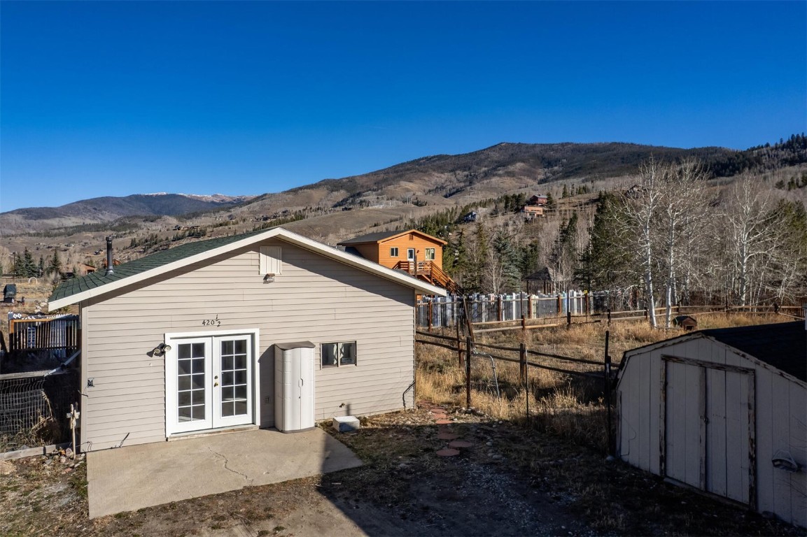 420 Reese Road Silverthorne, CO 80498 - Photo 31 of 50 a view of a house with a yard