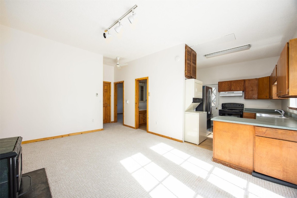 420 Reese Road Silverthorne, CO 80498 - Photo 37 of 50 a view of a kitchen with a sink cabinets and window