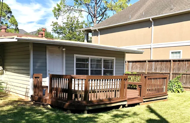 a front view of a house with a porch