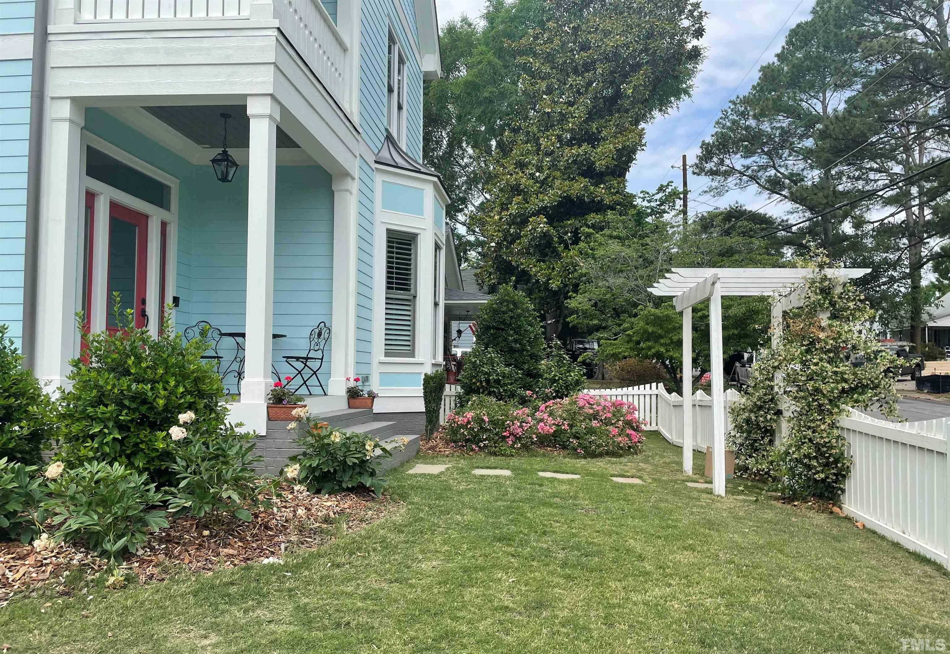 516 Sasser Street Raleigh, NC 27604 - Photo 3 of 30 a front view of a house with garden