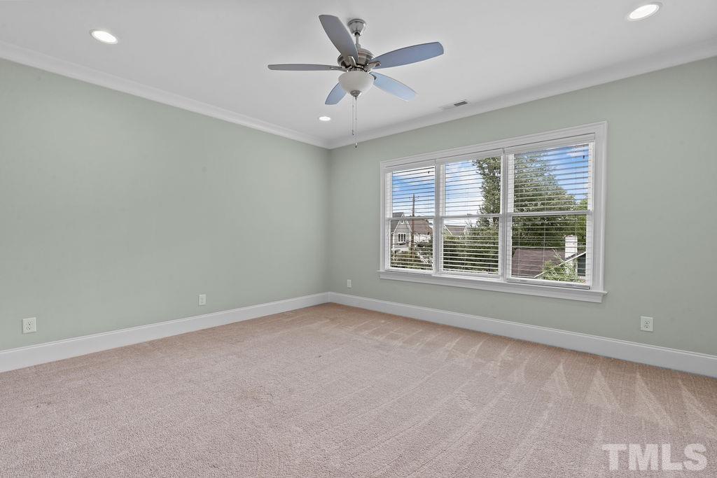 516 Sasser Street Raleigh, NC 27604 - Photo 21 of 30 a view of an empty room with a window