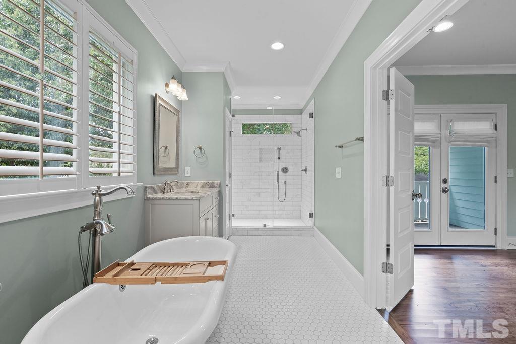 516 Sasser Street Raleigh, NC 27604 - Photo 25 of 30 a bathroom with a sink a toilet and shower