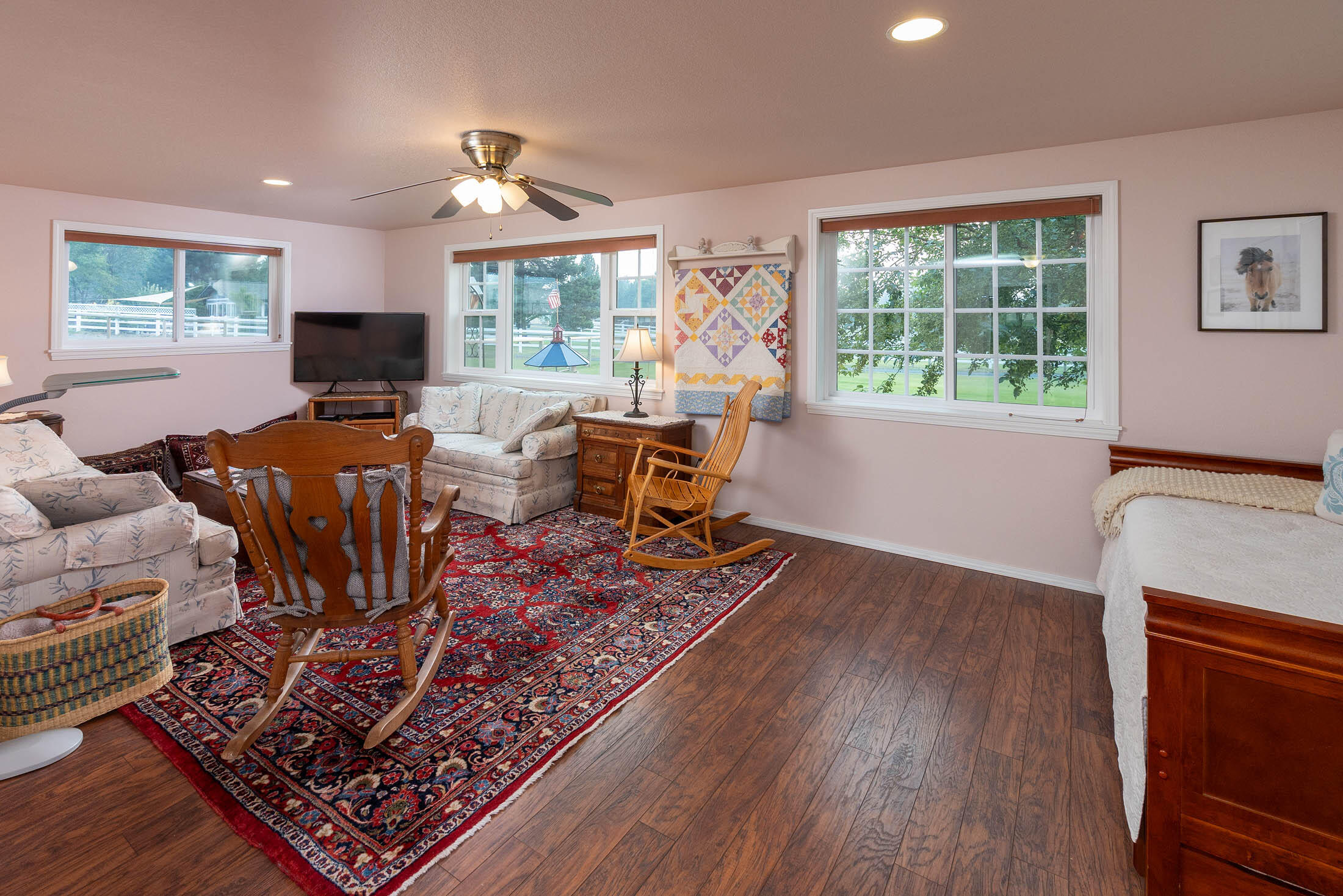 21665 Old Red Road Bend, OR 97702 - Photo 19 of 34 In-law suite living room with plenty of windows to capture cascade mountain views.