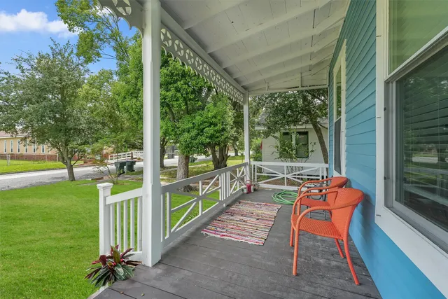 a view of a chair and tables in the garden
