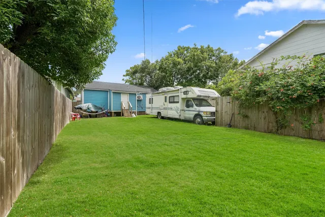 a house view with a garden space