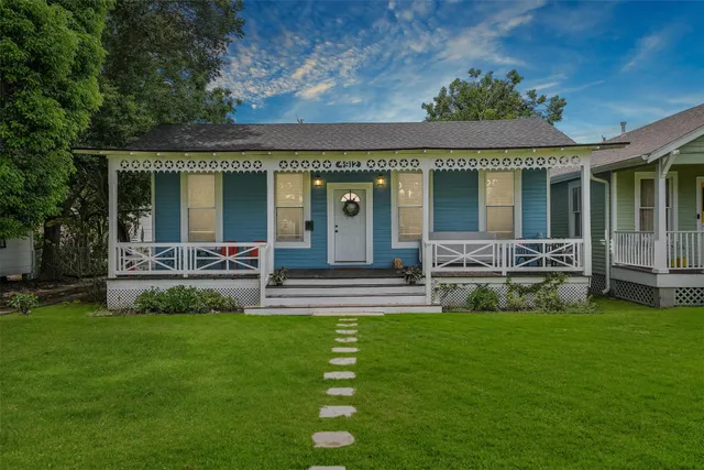 a view of a house with a garden