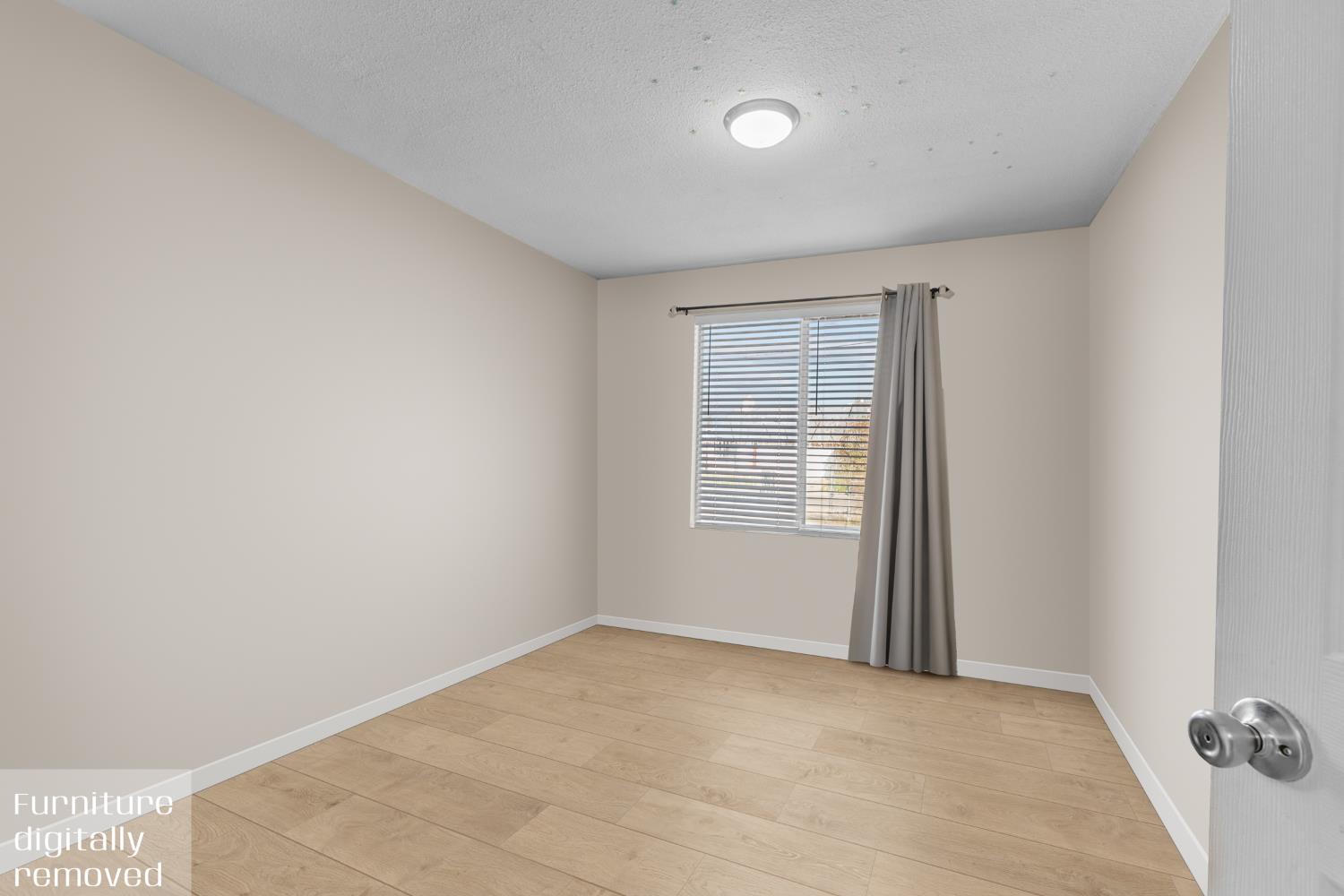 6228 Fowler Avenue Sacramento, CA 95828 - Photo 13 of 47 an empty room with a window