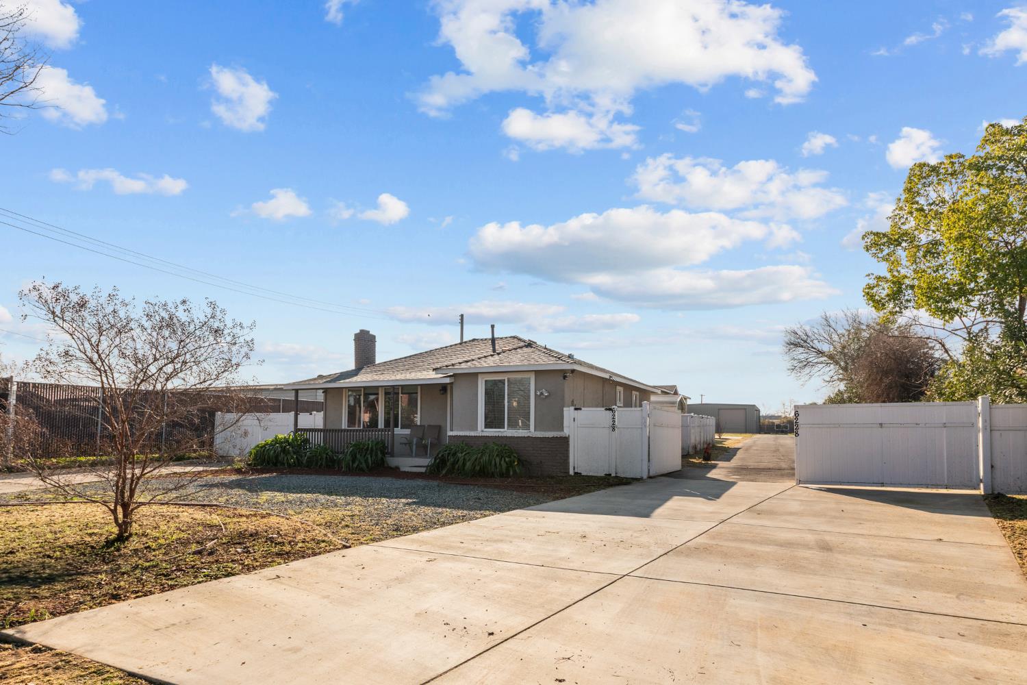 6228 Fowler Avenue Sacramento, CA 95828 - Photo 18 of 47 a front view of a house with a yard