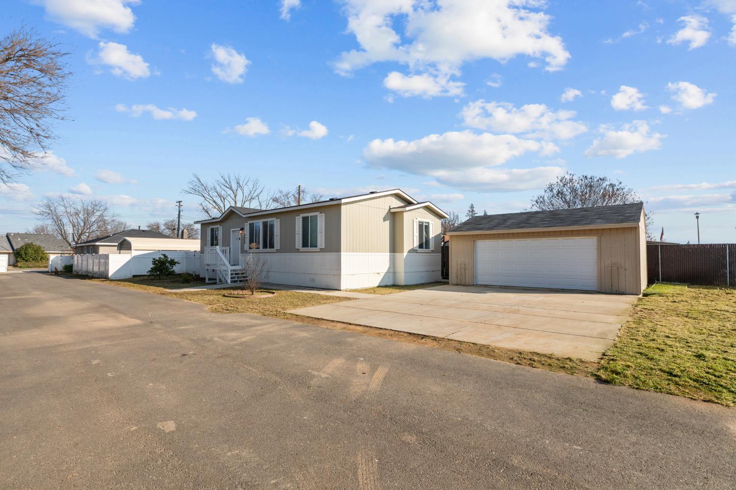 6228 Fowler Avenue Sacramento, CA 95828 - Photo 21 of 47 a house with a road and city view