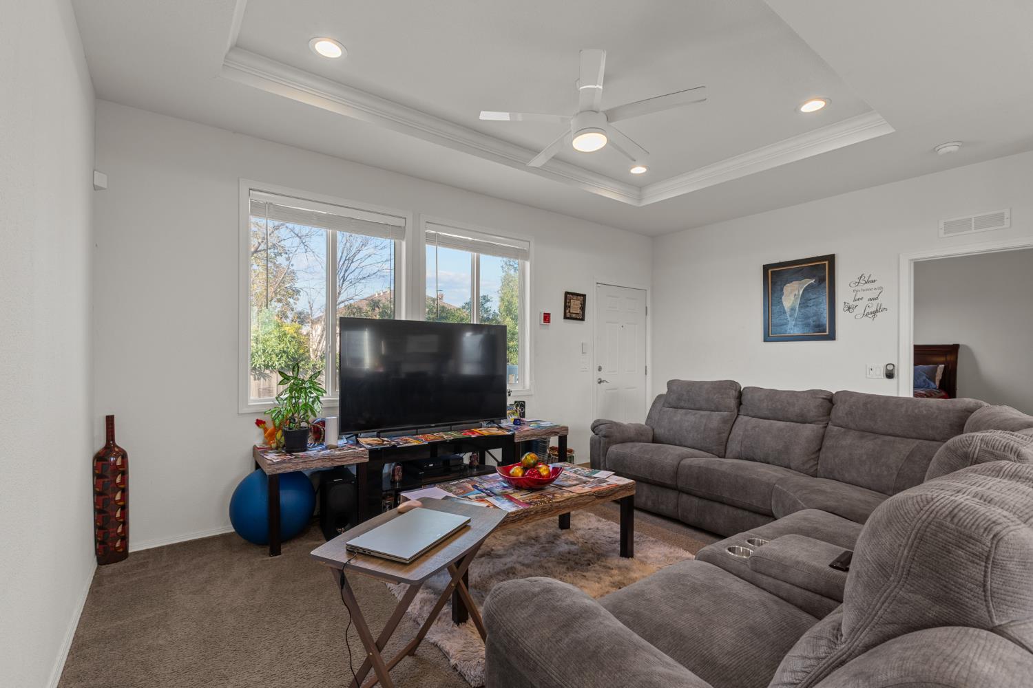 6228 Fowler Avenue Sacramento, CA 95828 - Photo 25 of 47 a living room with furniture and a flat screen tv