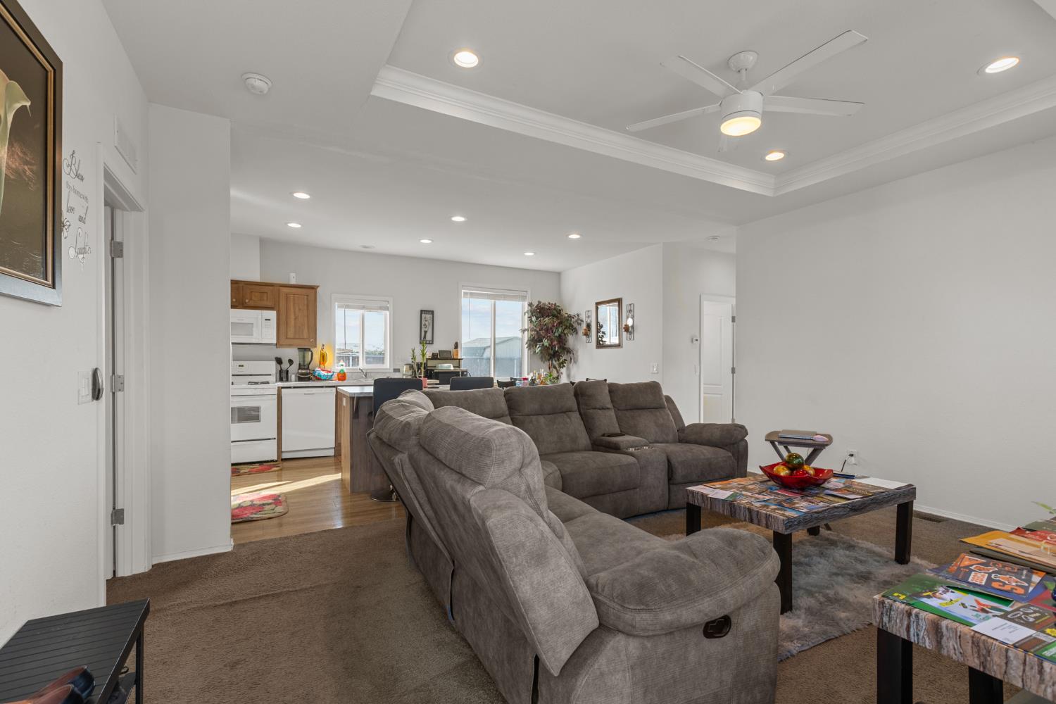 6228 Fowler Avenue Sacramento, CA 95828 - Photo 26 of 47 a living room with furniture and a view of kitchen