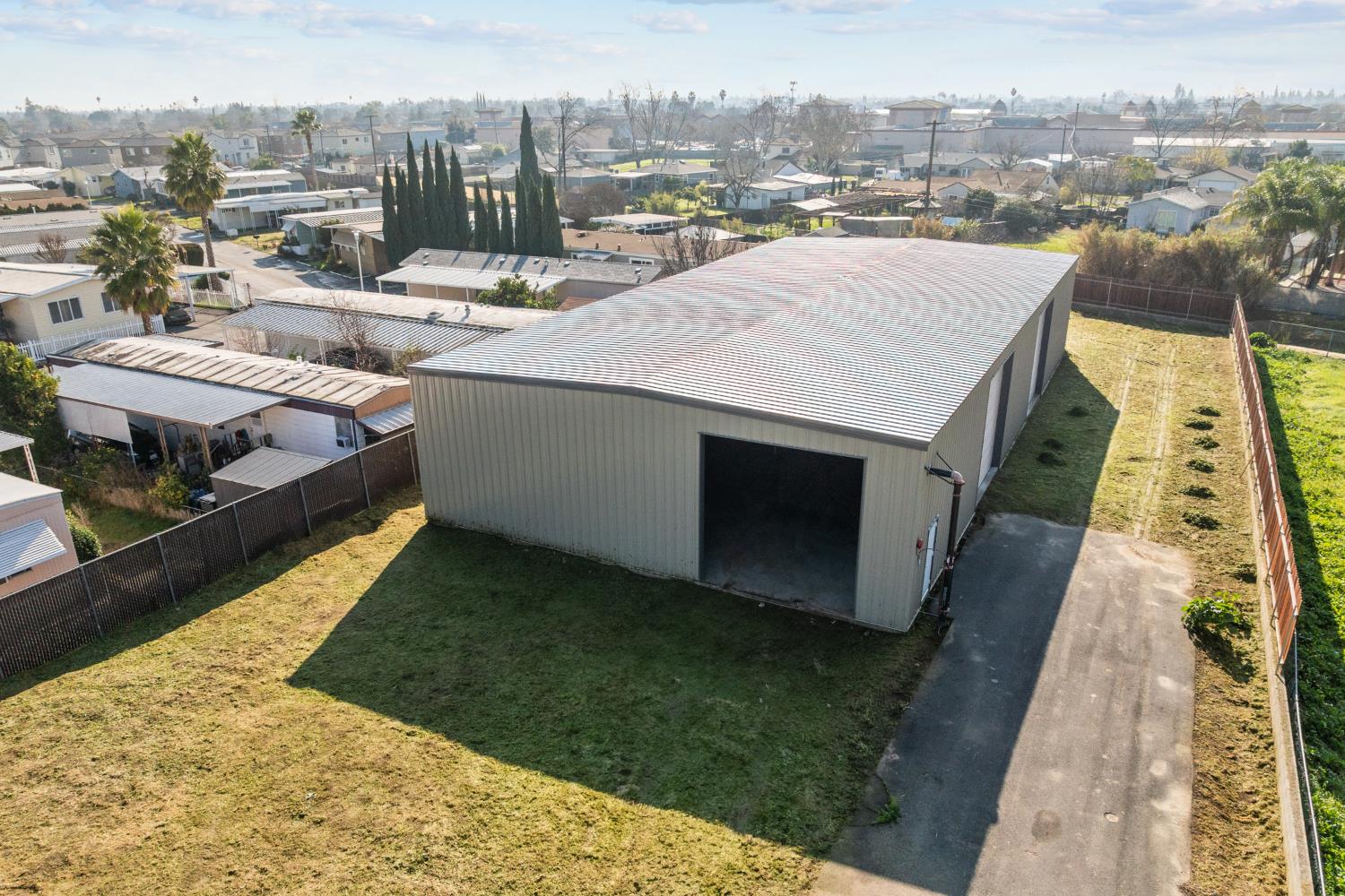 6228 Fowler Avenue Sacramento, CA 95828 - Photo 38 of 47 a view of a swimming pool with a lounge chairs
