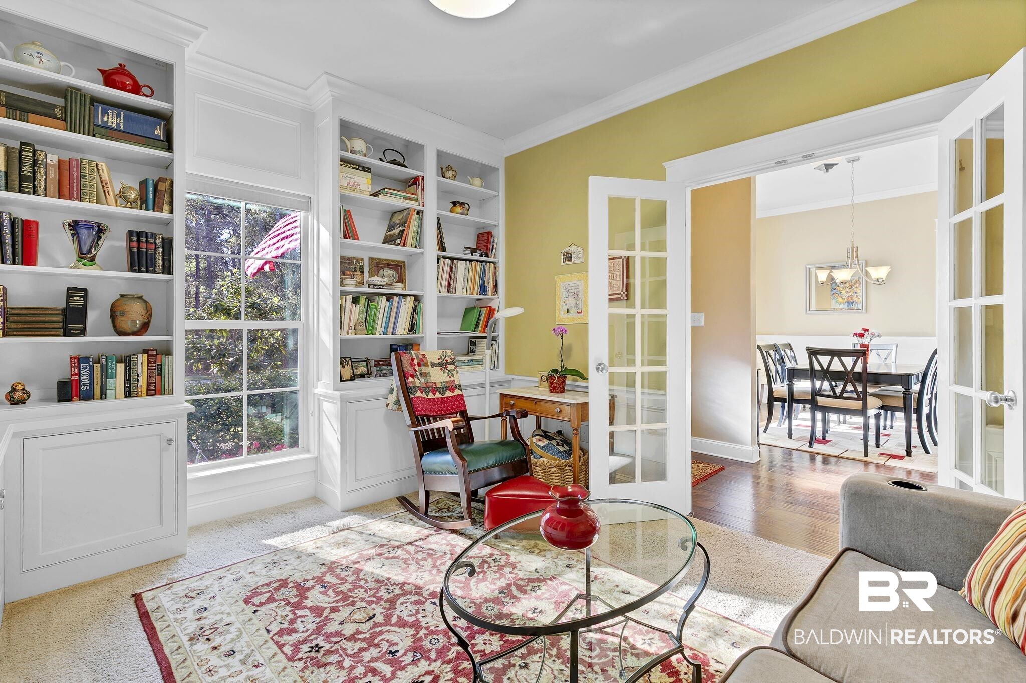 20105 Bunker Loop Fairhope, AL 36532 - Photo 37 of 65 Sitting room with plenty of natural light, built in bookshelves and french doors