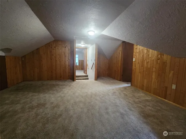 an empty room with a bathroom