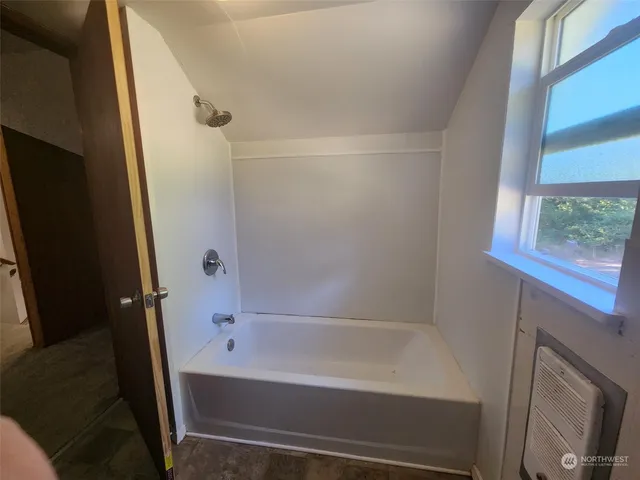 a bathroom with a bathtub