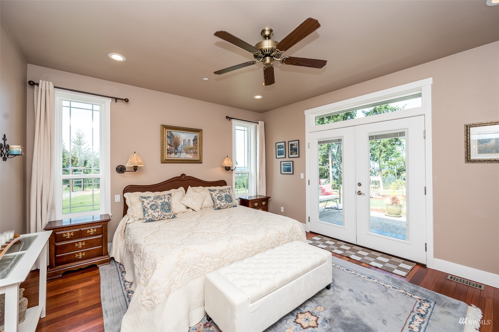 25920 80th Avenue East Graham, WA 98338 - Photo 20 of 40 a bedroom with a large bed and a window