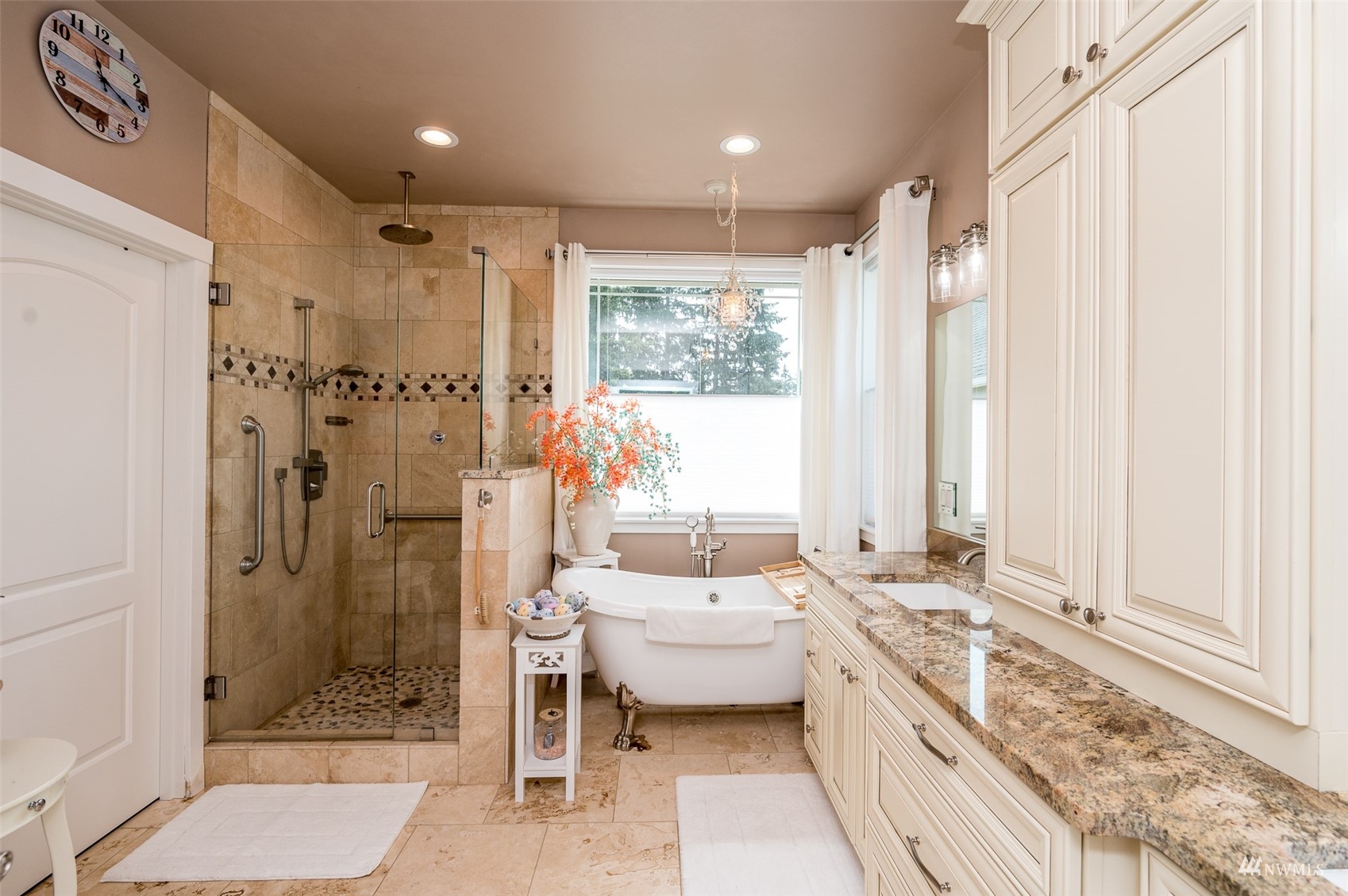 25920 80th Avenue East Graham, WA 98338 - Photo 22 of 40 a bathroom with a granite countertop sink a toilet and shower