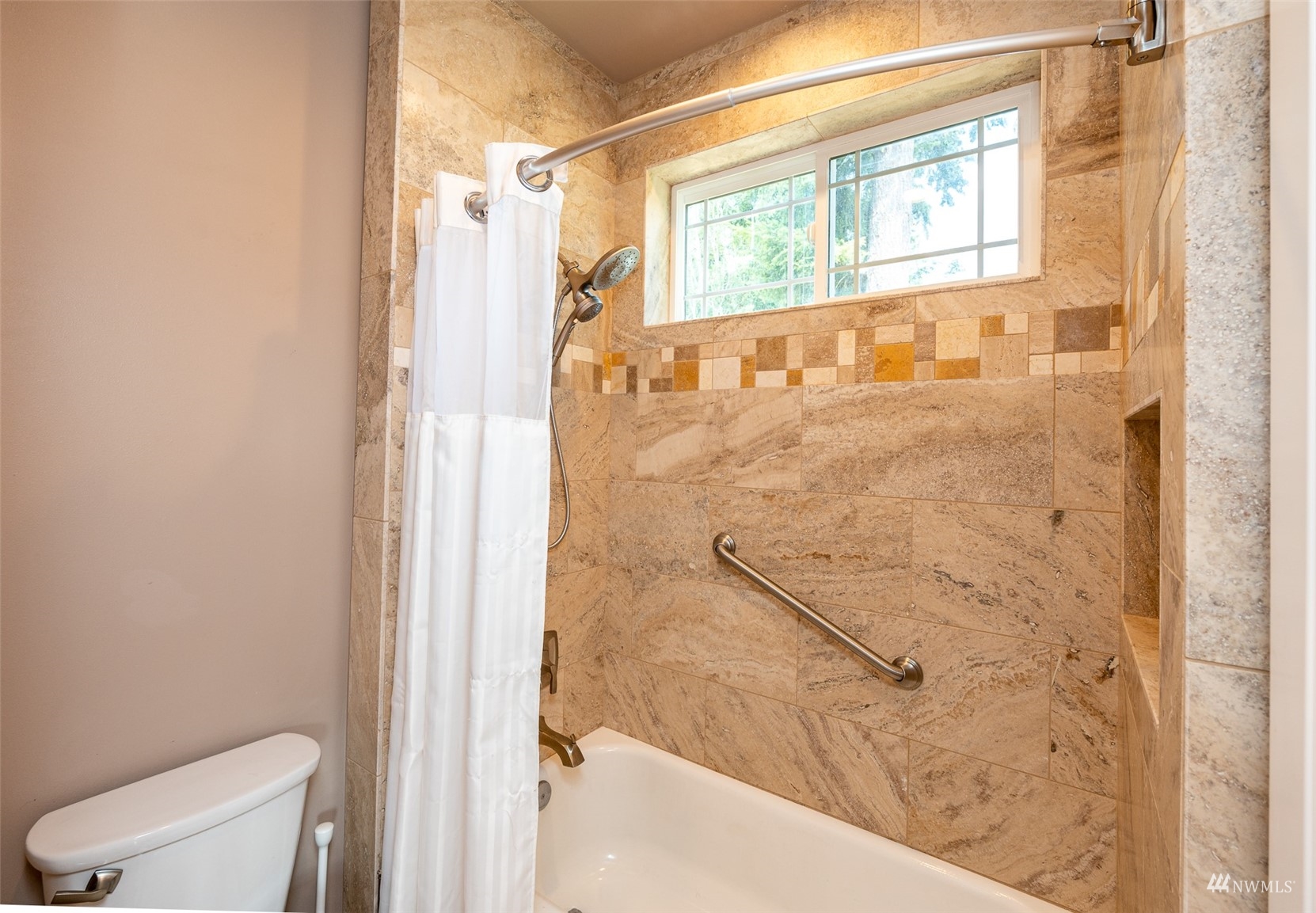 25920 80th Avenue East Graham, WA 98338 - Photo 27 of 40 a bathroom with a bathtub and shower