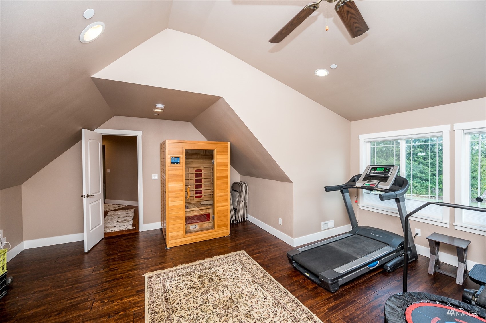25920 80th Avenue East Graham, WA 98338 - Photo 29 of 40 a living room with furniture and a rug
